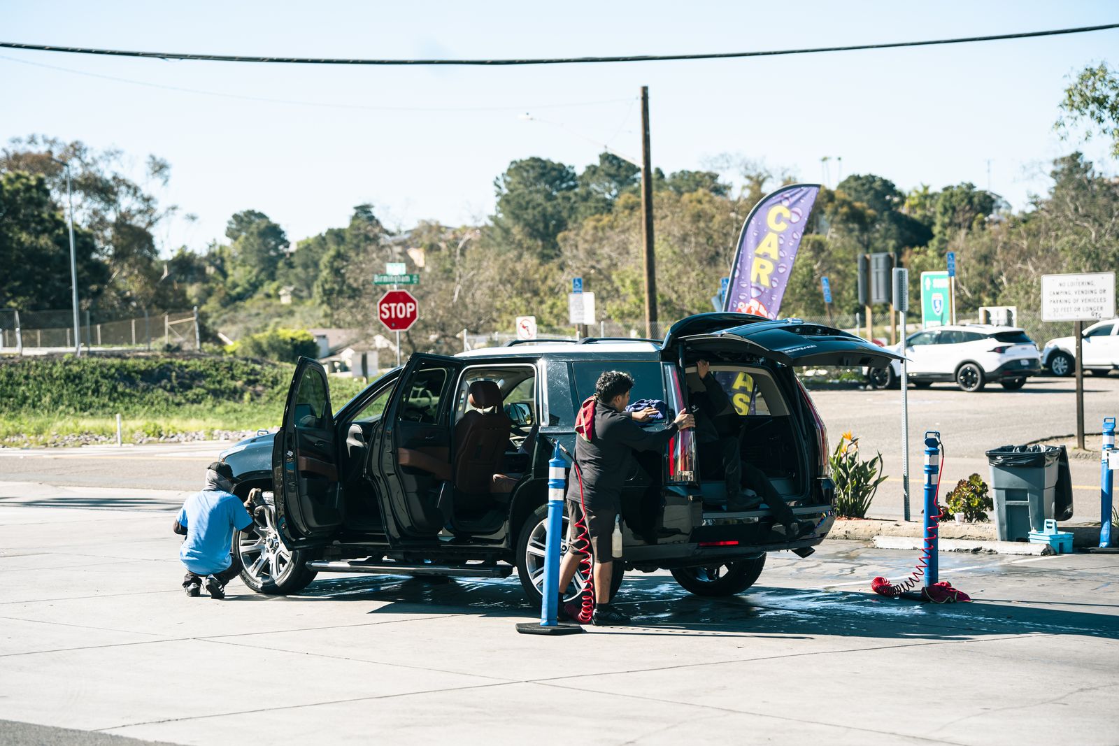 The Cardiff Car Wash lot with feather flags flying