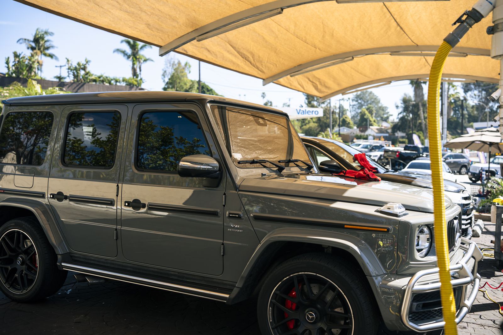 A Mercedes G-Wagen under the shade canopy